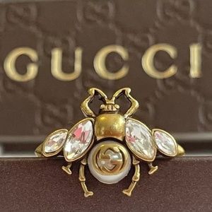 Gucci Ring, crystal stone wings & double GG Symptom